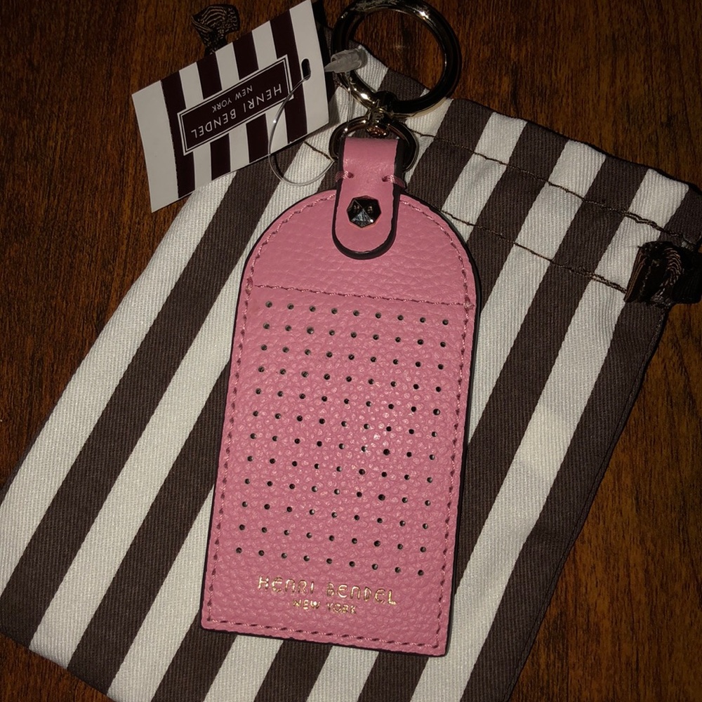 Pink Henri Bendel luggage tag